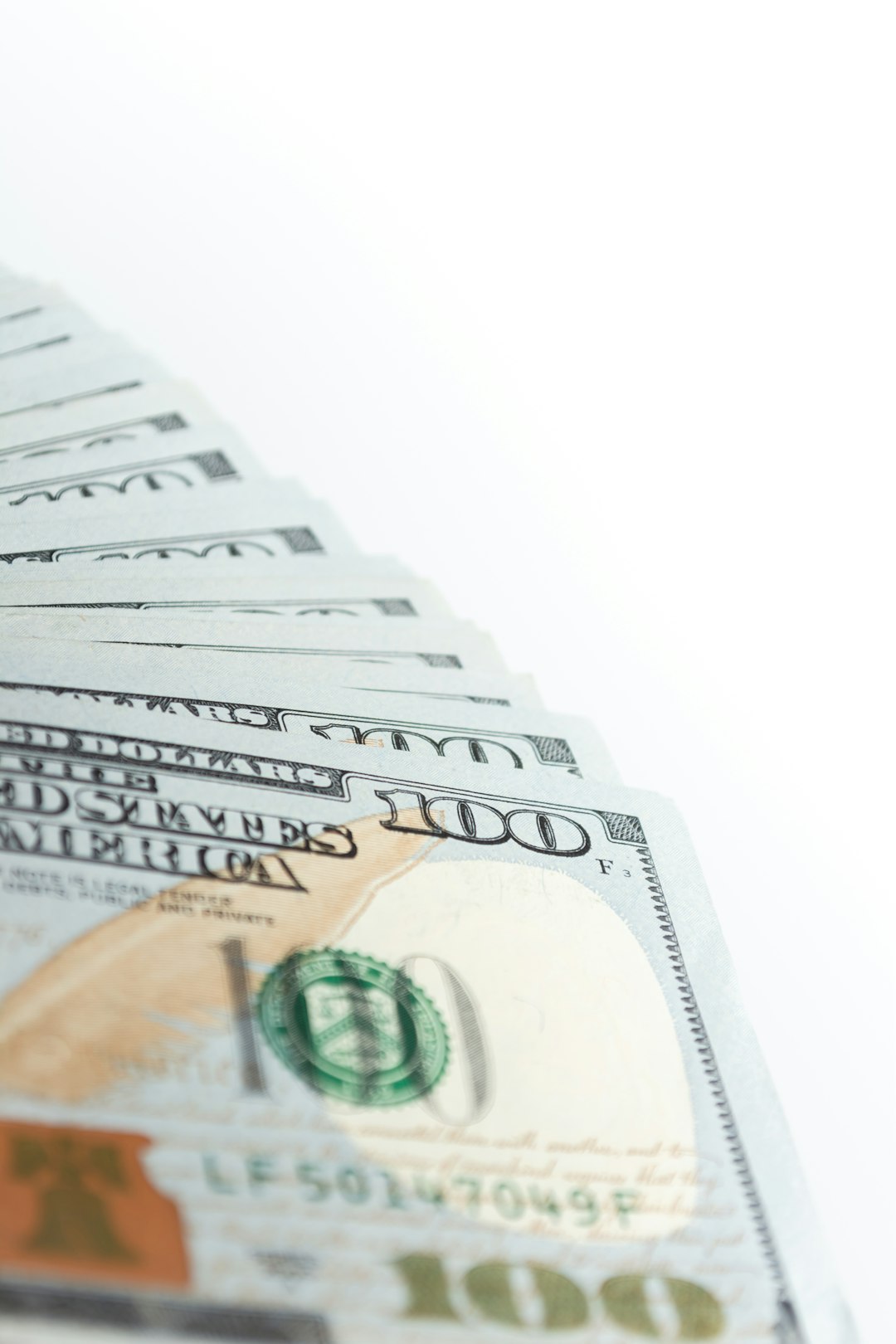 a-stack-of-twenty-dollar-bills-sitting-on-top-of-each-other-ze6uxom9uiq